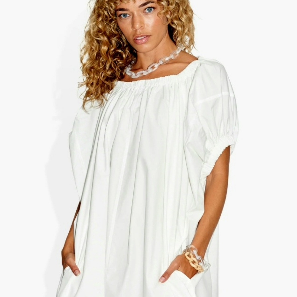 The Celect Shelter Dress